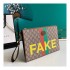 Gucci 'Fake/Not' Print Print Pouch 636171