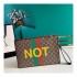 Gucci 'Fake/Not' Print Print Pouch 636171