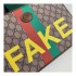 Gucci 'Fake/Not' Print Print Pouch 636171