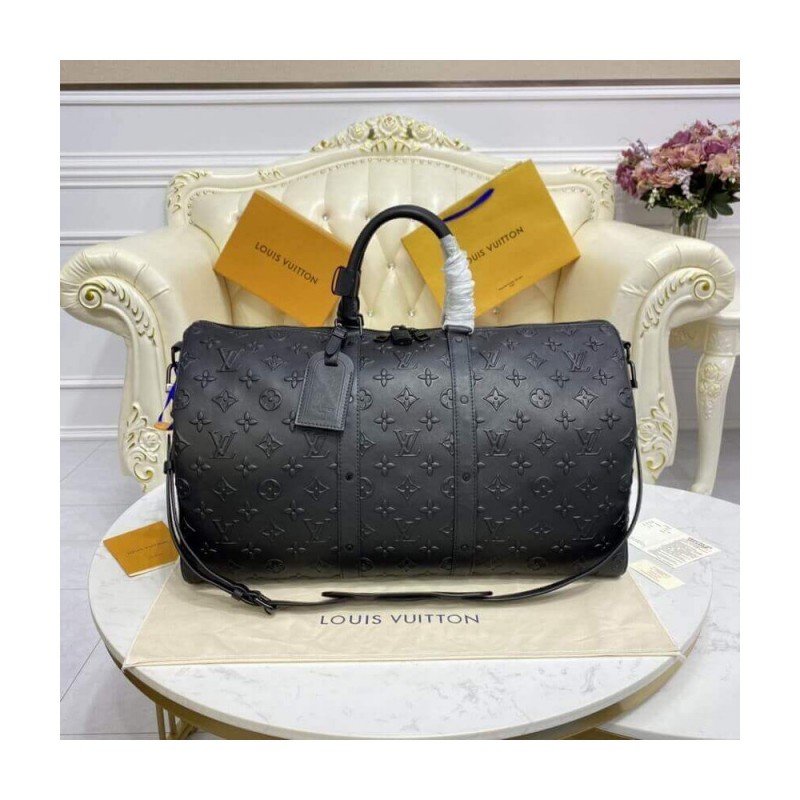 Louis Vuitton Monogram Seal Cowhide Leather Keepall Bandouliere 50 M57963