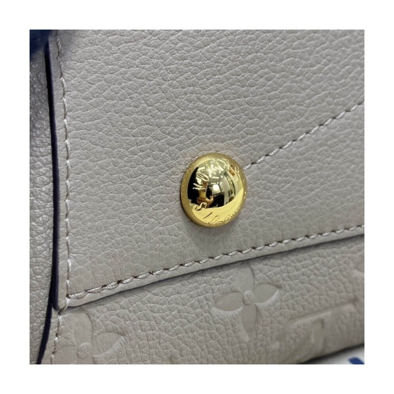 Louis Vuitton Monogram Empreinte Leather Montaigne MM M41048