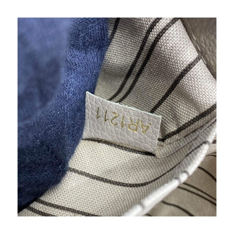 Louis Vuitton Monogram Empreinte Leather Montaigne MM M41048