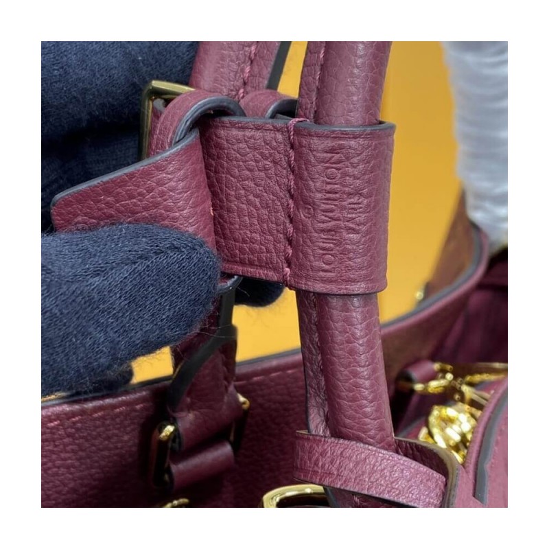 Louis Vuitton Monogram Empreinte Leather Montaigne MM M41048