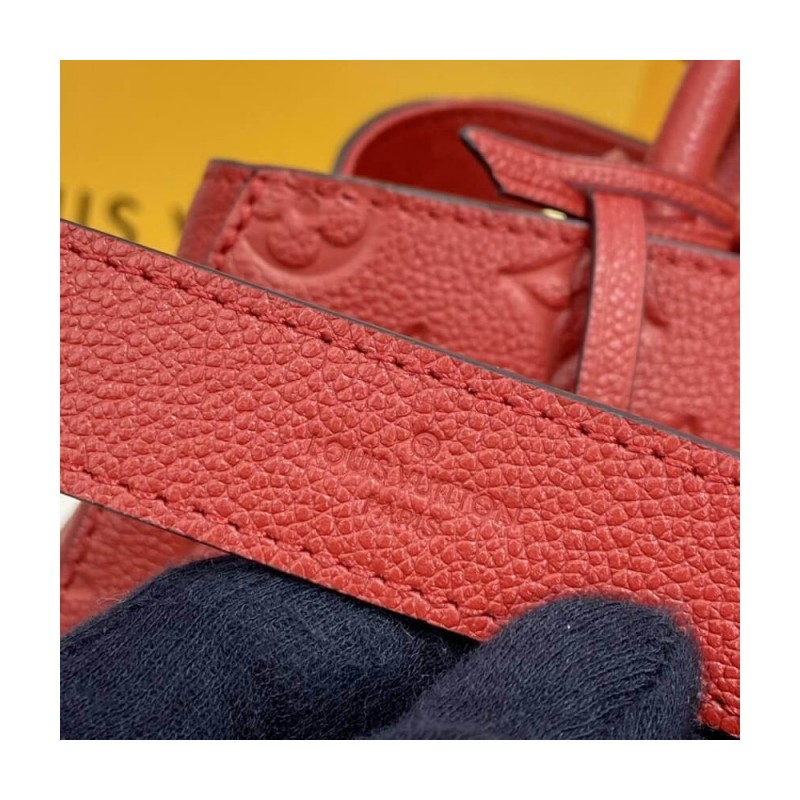 Louis Vuitton Monogram Empreinte Leather Montaigne MM M41048