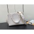 Louis Vuitton Grained calf leather Lock & Go Lockcme Handbag M23637