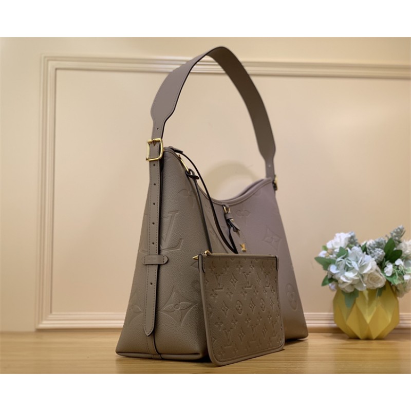 Louis Vuitton CarryAll PM bag in Monogram Empreinte leather M46292