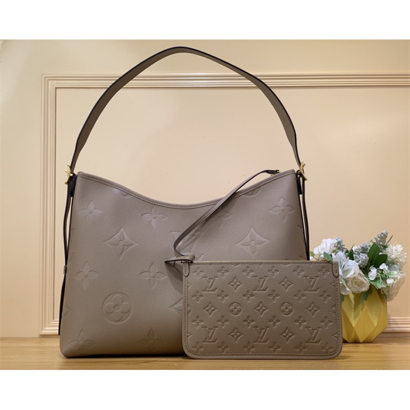 Louis Vuitton CarryAll PM bag in Monogram Empreinte leather M46292