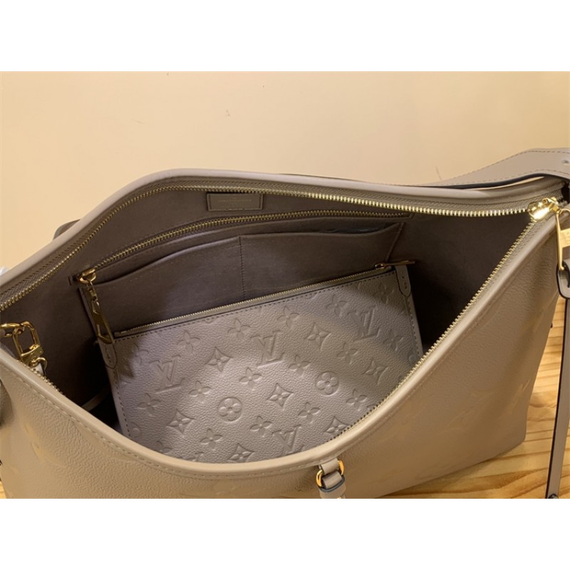 Louis Vuitton CarryAll PM bag in Monogram Empreinte leather M46292