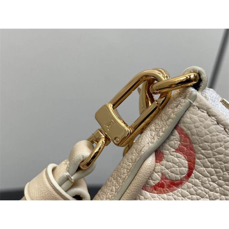 Louis Vuitton Monogram Empreinte leather Easy Pouch on Strap M83448
