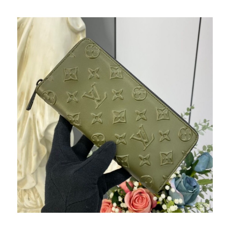 Louis Vuitton Monogram Seal Cowhide Leather Zippy Wallet Vertical M80505